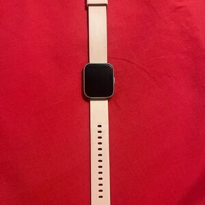 Elegant Smartwatch with Soft Pink Band